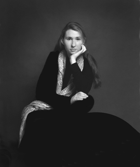 photograph of a young woman with a scarf